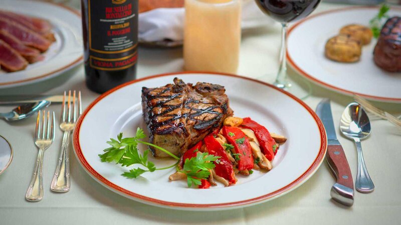 Plated veal chop entree.