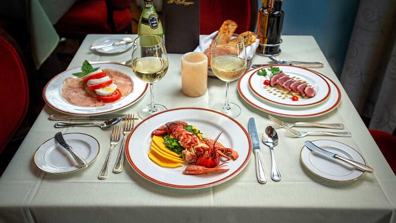 Three plated entrees tuna, lobster and buffalo mozzarella.